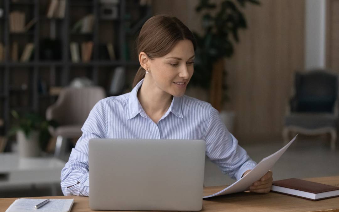 Woman reviewing health insurance documents