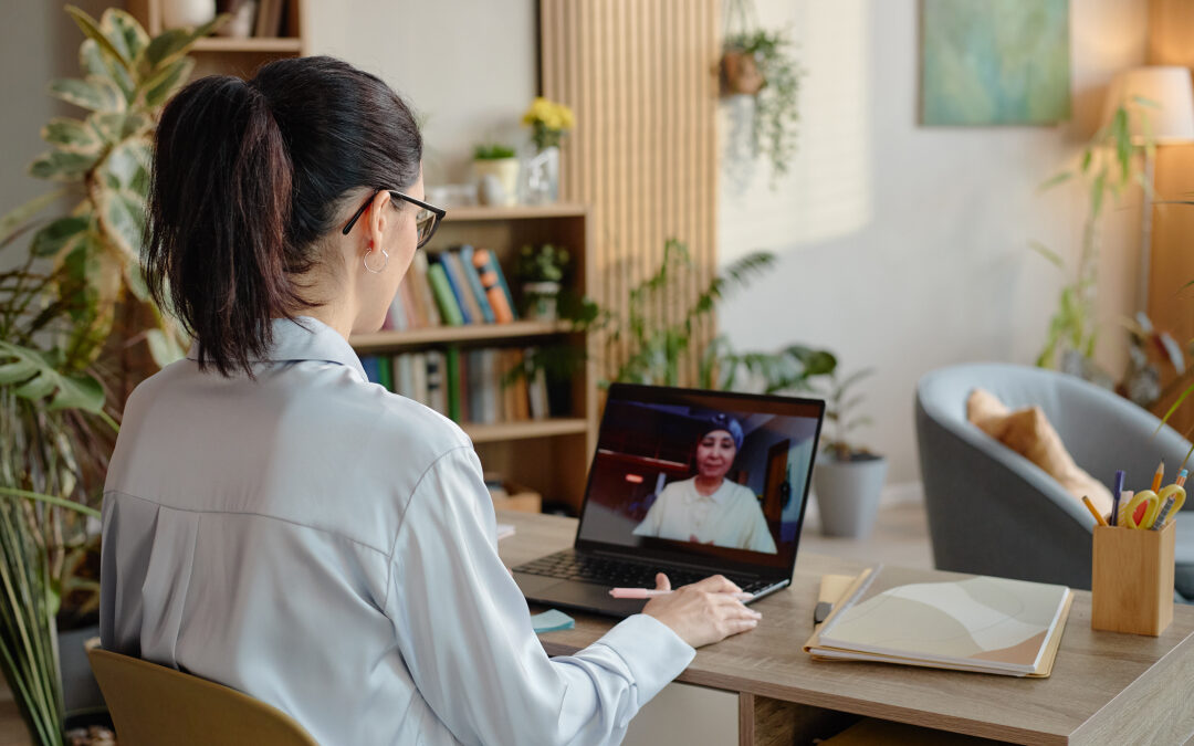 Psychologist conducting an online therapy session via video call